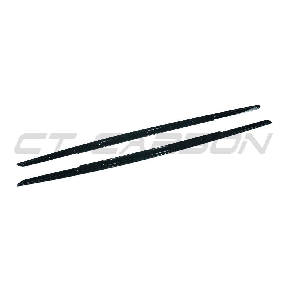 BMW 5 Series F10/F11 2011-2017 CT Carbon gloss black side skirts installed on vehicle, enhancing sporty exterior appearance.