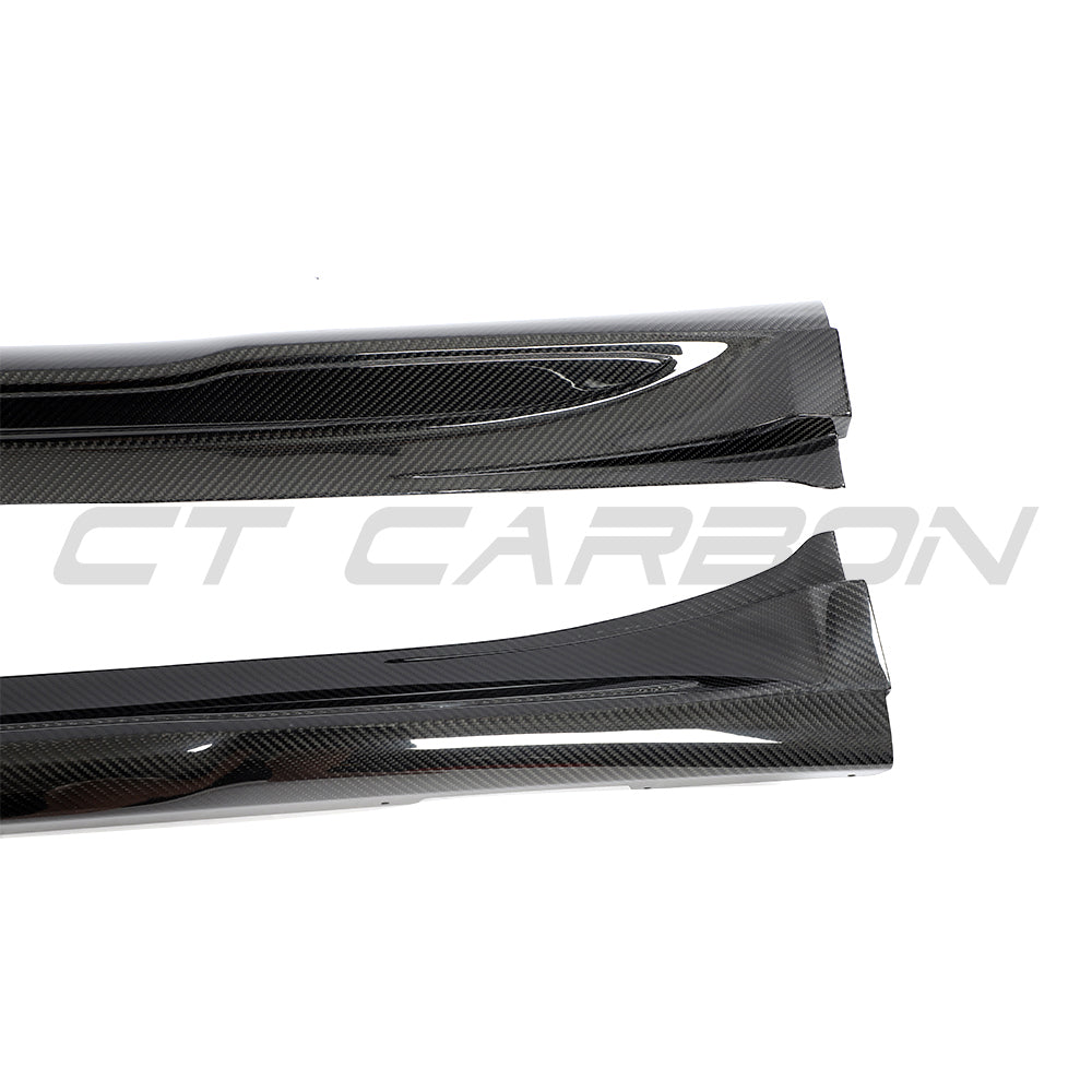 CT Carbon Porsche Taycan 2020-2024 carbon fibre side skirts installed on the vehicle, showcasing sleek aerodynamic design.