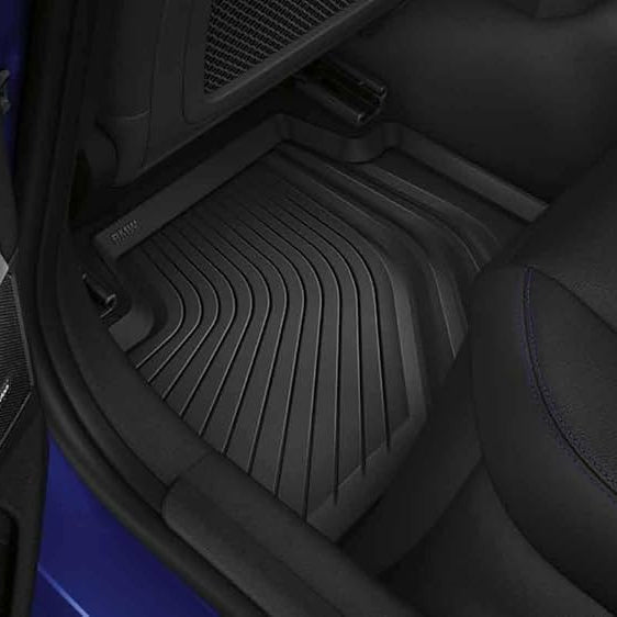 BMW Genuine rubber all weather mats for G22 G82 interior, durable black rubber mats with textured surface for protection.