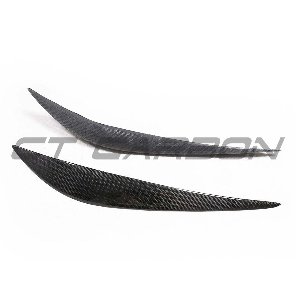 BMW F30 3 Series 2011-2018 dry carbon fiber eyelid accessory by CT Carbon, showing sleek, textured carbon fiber eyelids on the car.