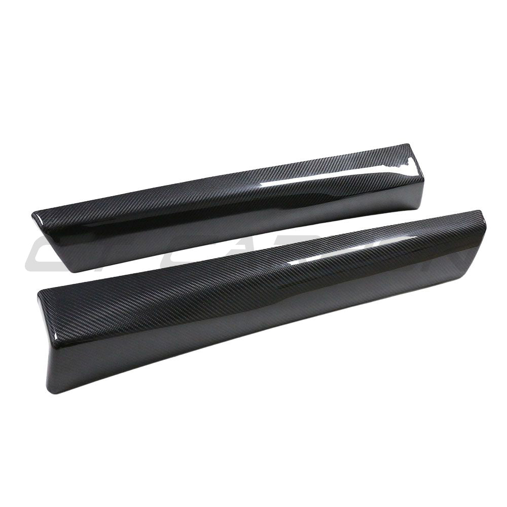 Tesla Model 3 2017-2023 carbon fiber interior door panel trim add-on by CT Carbon, showing sleek, textured carbon fiber surface.