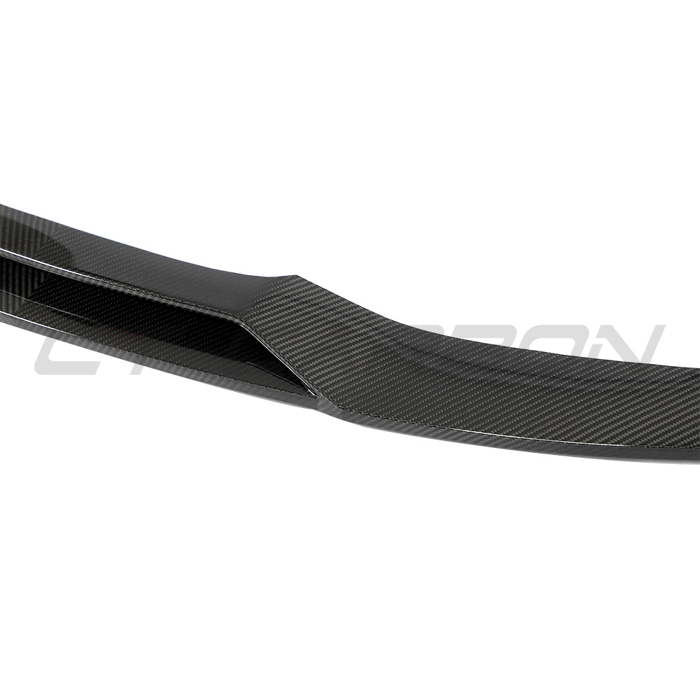 CT Carbon Porsche Taycan 2020-2024 carbon fiber splitter showing sleek aerodynamic design and detailed finish.