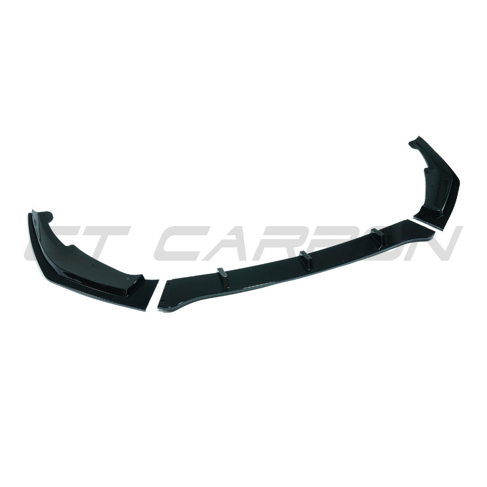 CT Carbon BMW Z4 G29 2019-2025 pre-LCI gloss black splitter installed on the front bumper of the sports car.