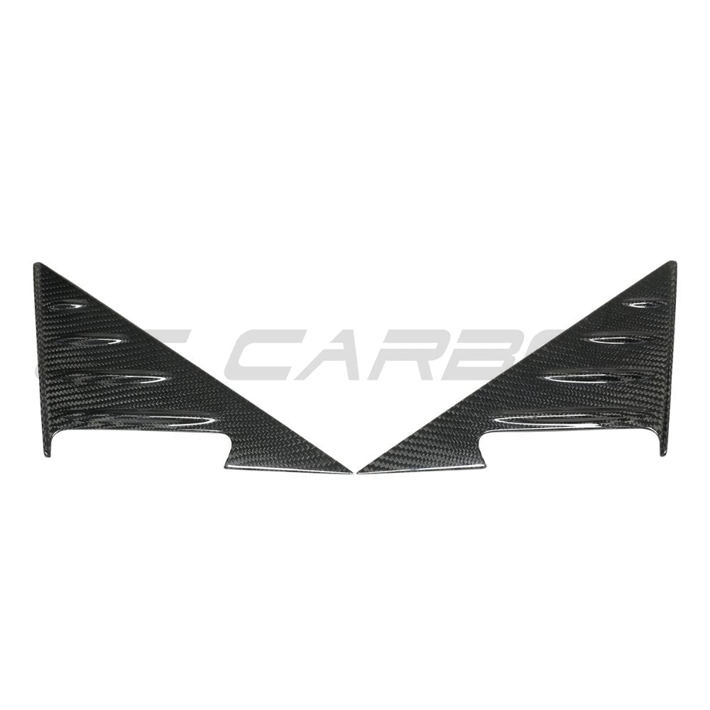 BMW G87 M2 2023 dry carbon fibre mirror pillar trim accessory by CT Carbon, showing close-up of sleek carbon fibre surface.