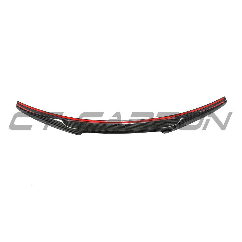 BMW M2 F87 M2C carbon fibre spoiler by CT Carbon installed on a sports car, showcasing sleek design and lightweight construction.