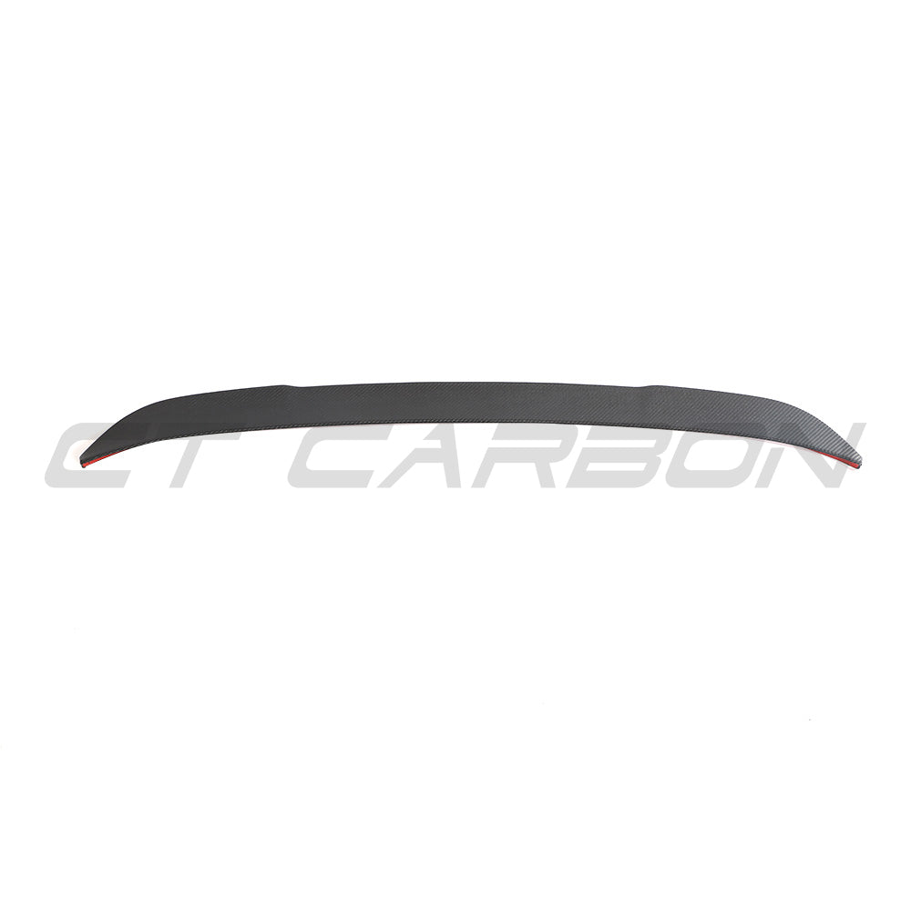 BMW G02 X4 and F98 X4M carbon fibre spoiler by CT Carbon, shown installed on the vehicle's rear for enhanced aerodynamics.