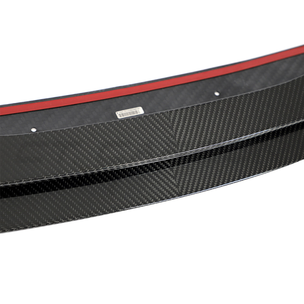 CT Carbon Porsche Taycan 2020-2024 carbon fibre splitter installed on front bumper, showcasing sporty aerodynamic design.