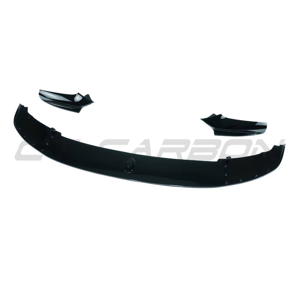 BMW 5 Series F10/F11 2011-2017 CT Carbon gloss black splitter installed on front bumper, showcasing a sleek automotive accessory.