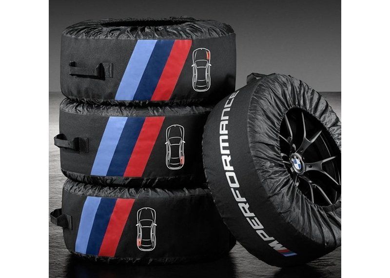 Genuine BMW M Performance tyre storage bag set for F10, F30, F90, G20 models, black fabric with BMW logo accents.
