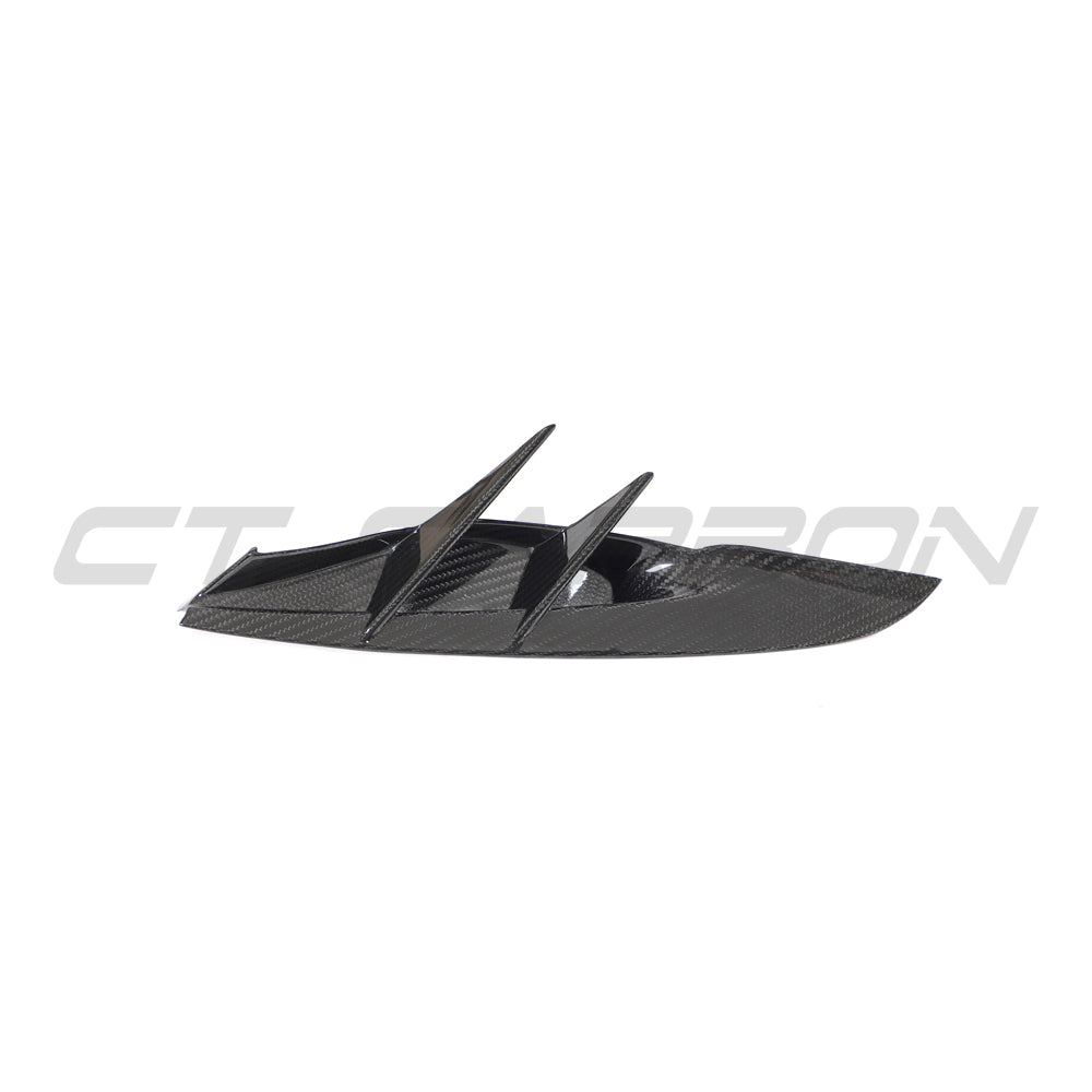Carbon fiber front bumper vent trim for Toyota Supra 2019+ A90 by CT Carbon, showing the sleek textured surface and precise fit.