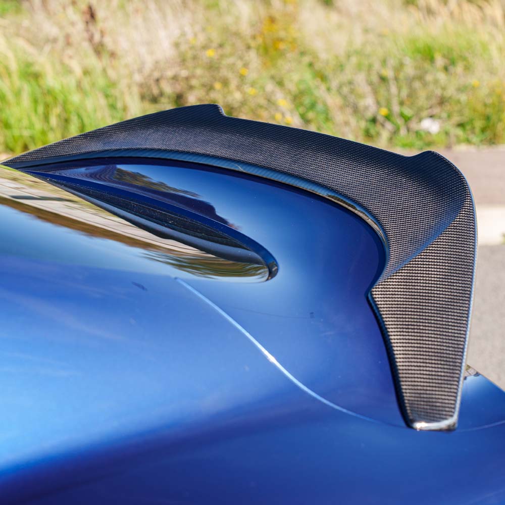 Toyota Supra 2019+ A90 Ultimate carbon fiber kit by CT Carbon installed on a sleek sports car.