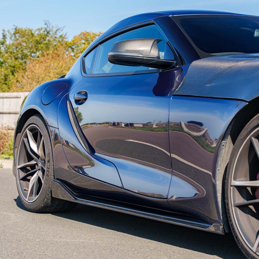 Toyota Supra 2019+ A90 Ultimate Carbon Fibre Kit by CT Carbon, showcasing sleek carbon fiber components on the sports car.