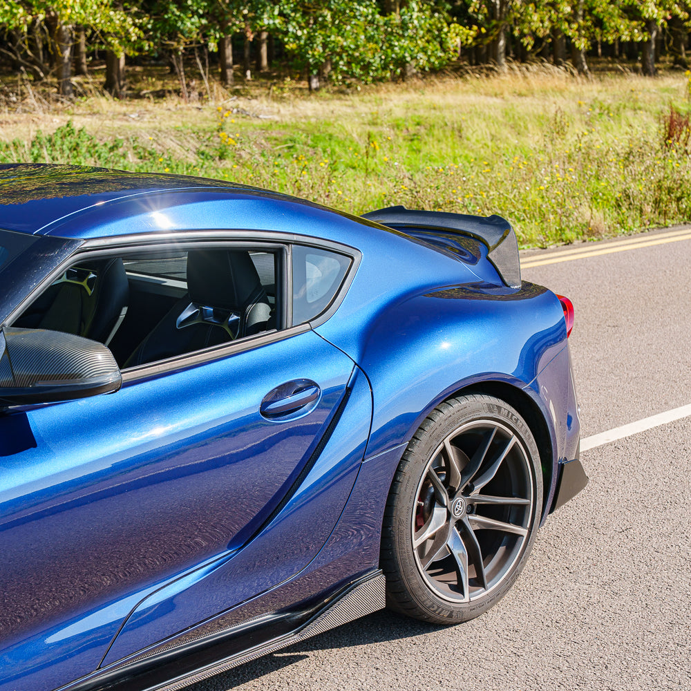 Toyota Supra 2019+ A90 V2 full carbon fiber kit by CT Carbon, showcasing the sleek carbon fiber exterior components.