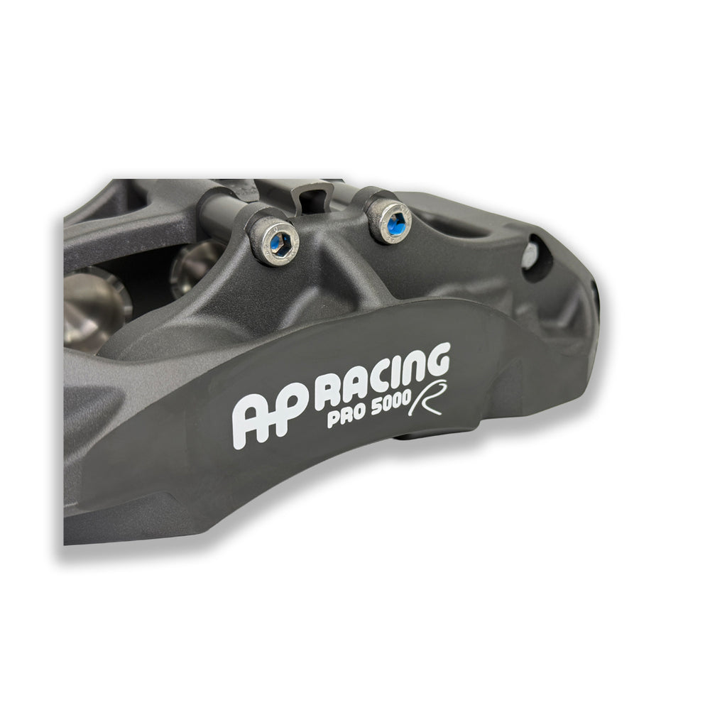 Pair of AP Racing Pro5000R big brake calipers with anodised finish, 6-piston design, suitable for high-performance brake kits.