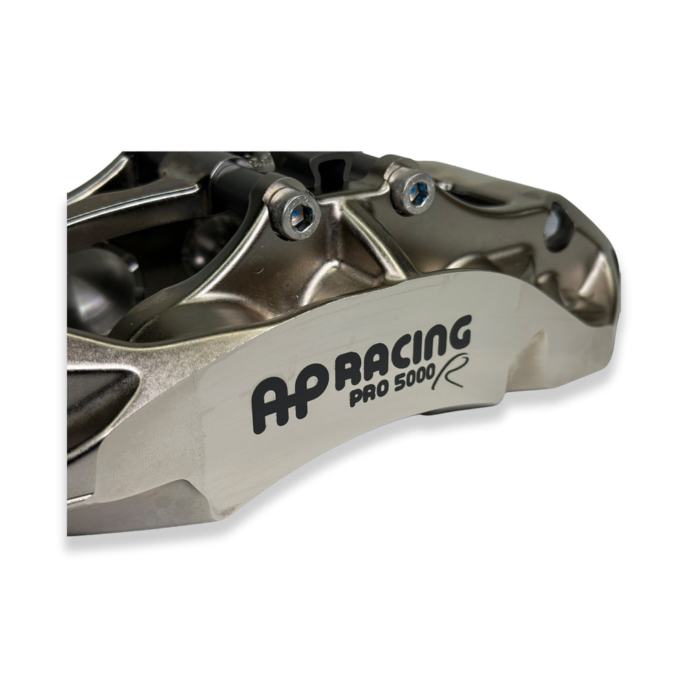 Pair of AP Racing Pro5000R big brake calipers in nickel finish with 6 pistons, designed for high-performance brake kits.