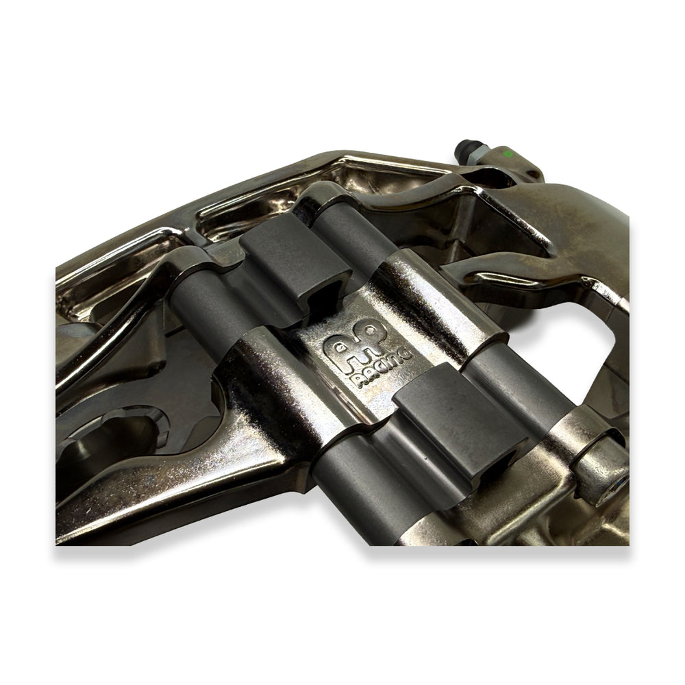 Pair of AP Racing Pro5000R big brake calipers with nickel finish and 6 pistons, designed for high-performance braking systems.