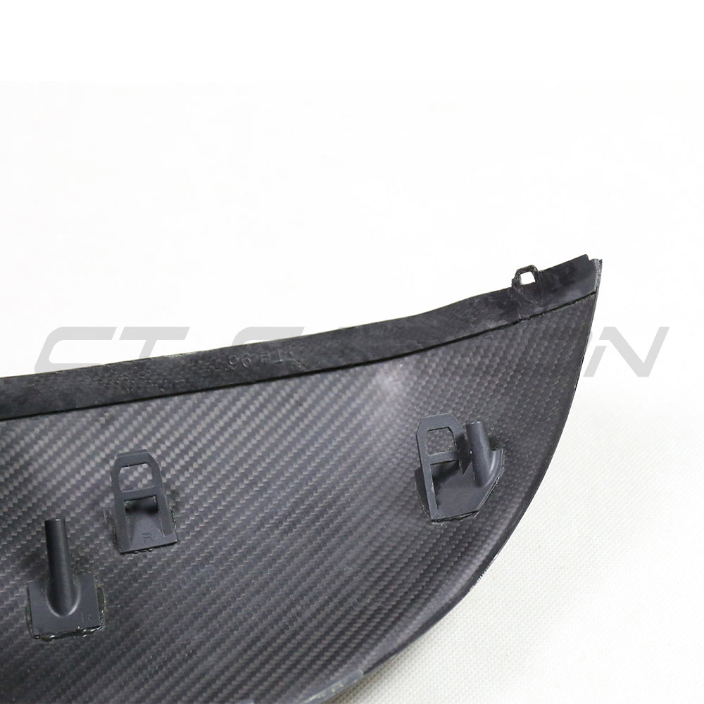 Carbon fiber side mirrors for Audi Q8, SQ8, RSQ8, and Lamborghini Urus with lane assist from CT Carbon, showing close-up of mirror housing.