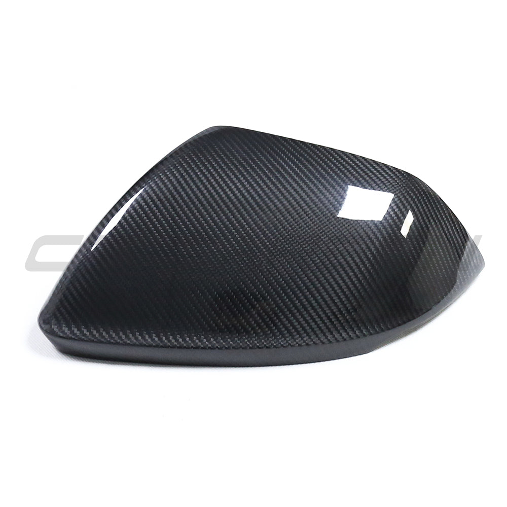 Carbon fibre side mirrors for Audi Q8, SQ8, RSQ8, and Lamborghini Urus by CT Carbon, without lane assist, shown from the side.