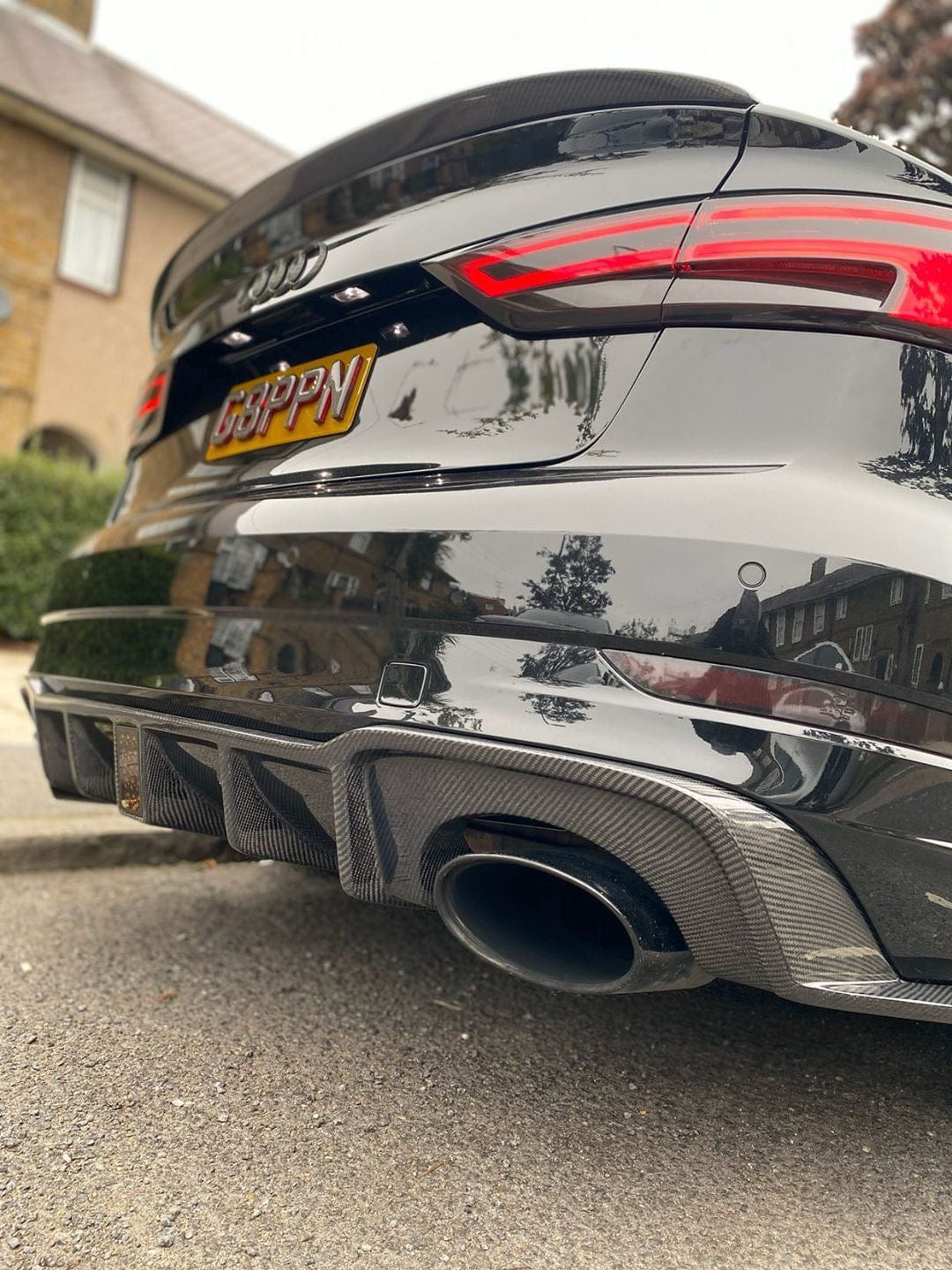 CT Carbon full carbon fiber kit installed on Audi RS3 8V facelift saloon, showcasing sleek carbon fiber accents and aerodynamic design.