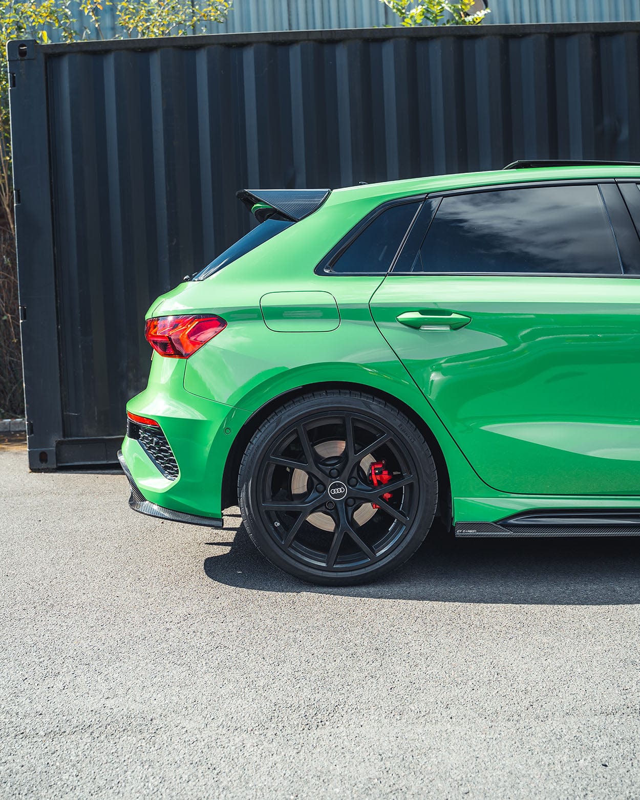 Audi RS3 8Y 2022+ carbon fibre side skirts by CT Design, showing sleek, textured side panel enhancements for sporty appearance.