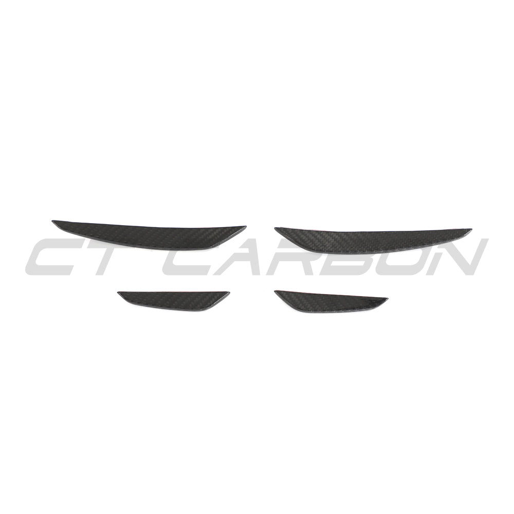 Carbon fiber front bumper canards for Audi RS3 8Y 2025+ by CT Carbon, shown on the vehicle's front bumper.