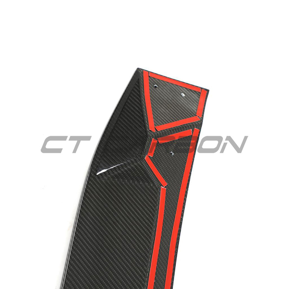Audi RS6 Avant full carbon fibre kit by CT Carbon, detailed view of car exterior with carbon fibre accents and kit components.