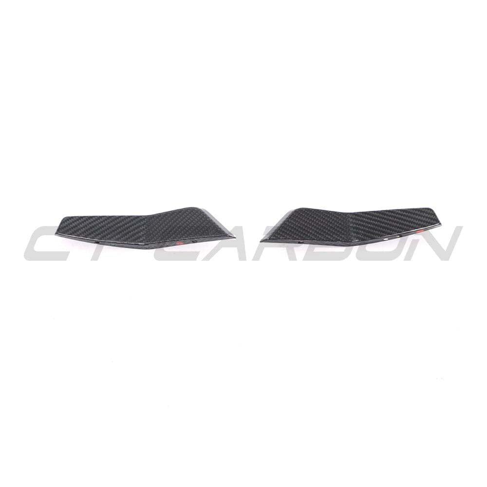 AUDI RS6 C8 2019+ full carbon fibre front end kit by CT Carbon, featuring carbon canards on the vehicle's front bumper.