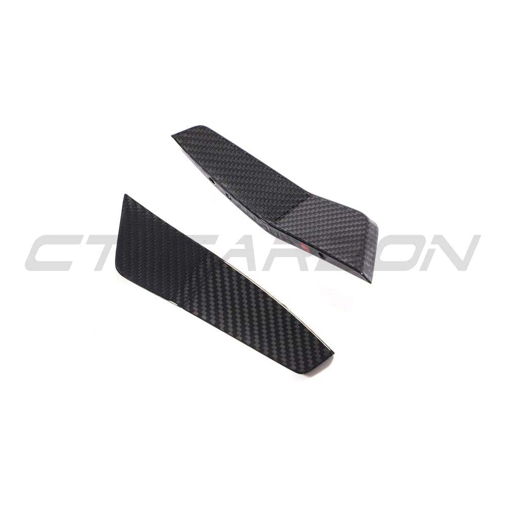 AUDI RS6 C8 2019+ full carbon fibre kit by CT Carbon, featuring front canards and aerodynamic enhancements on a sleek car.