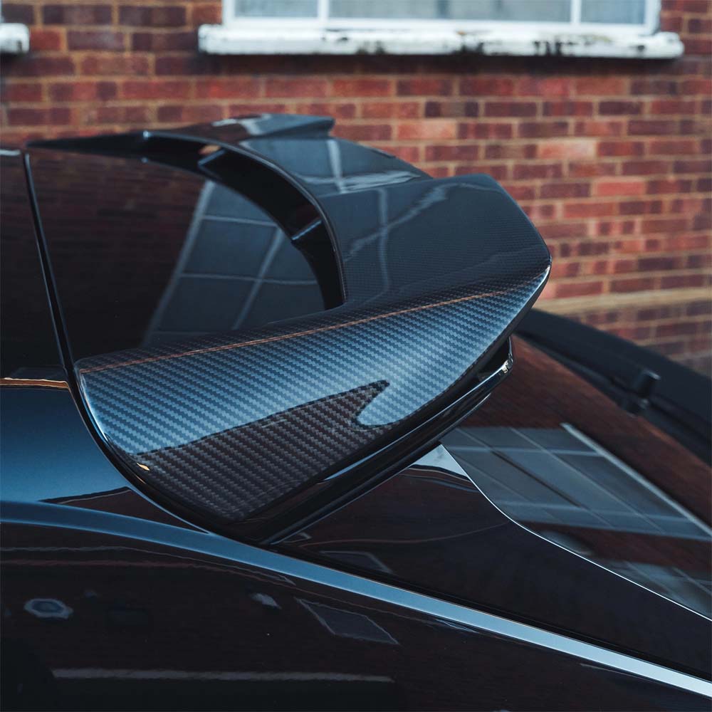 Carbon fiber full kit for Audi RSQ8 2020-2024 by CT Carbon, showing close-up of sleek, textured black carbon fiber components.