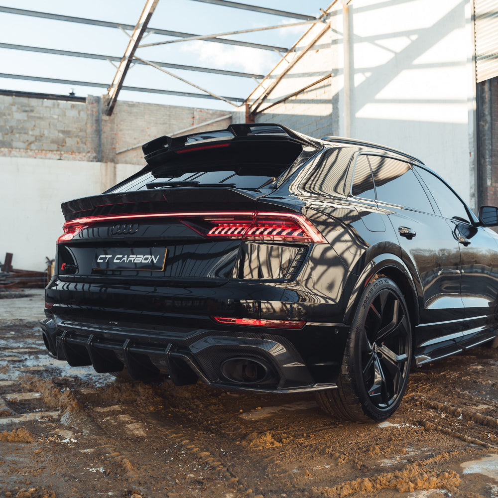 Carbon fibre roof spoiler for Audi RSQ8 2020+ by CT Design, showcasing sleek, aerodynamic design on the vehicle roof.