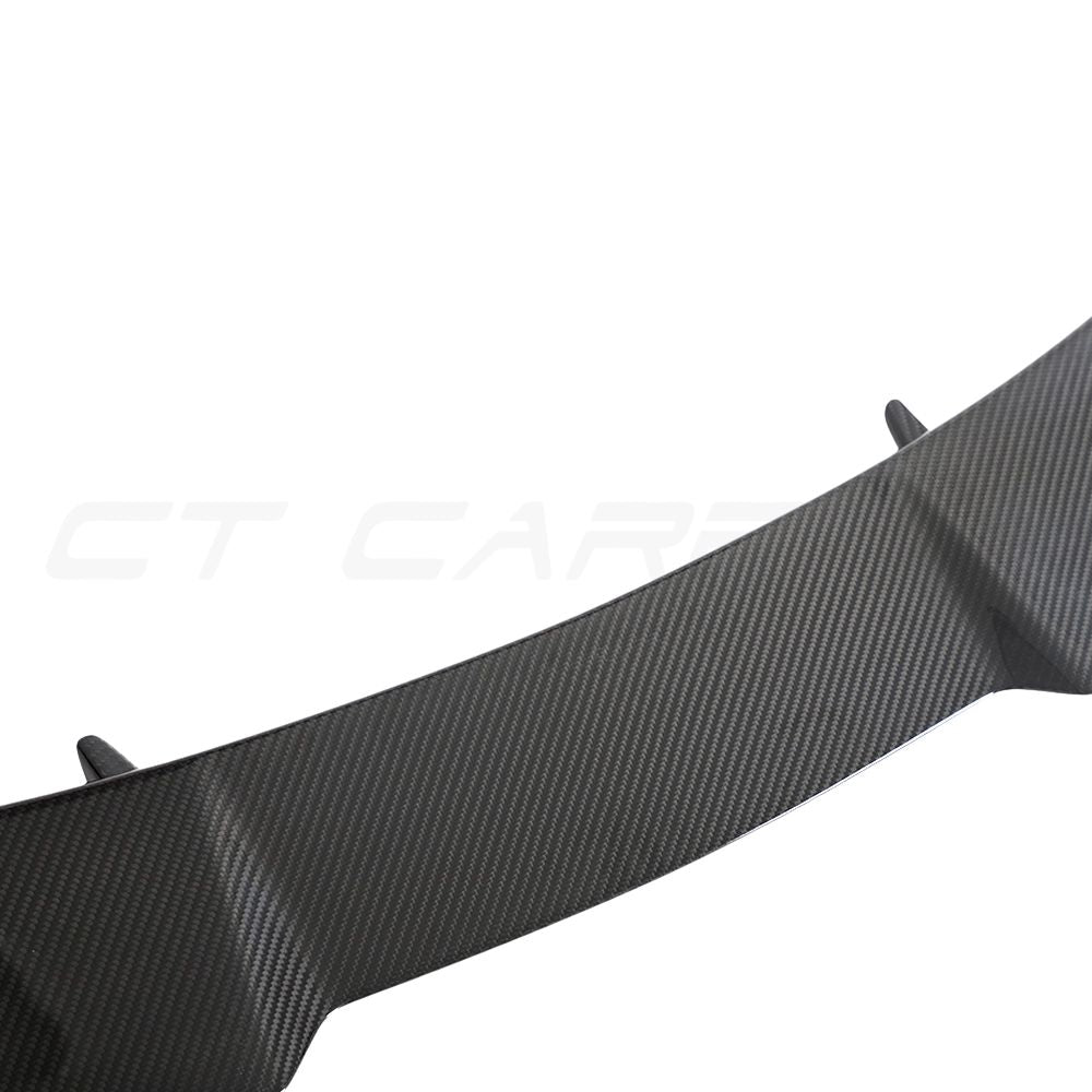Audi RSQ8 2020+ carbon fibre roof spoiler by CT Carbon, mounted on the vehicle's roof, enhancing sporty appearance.