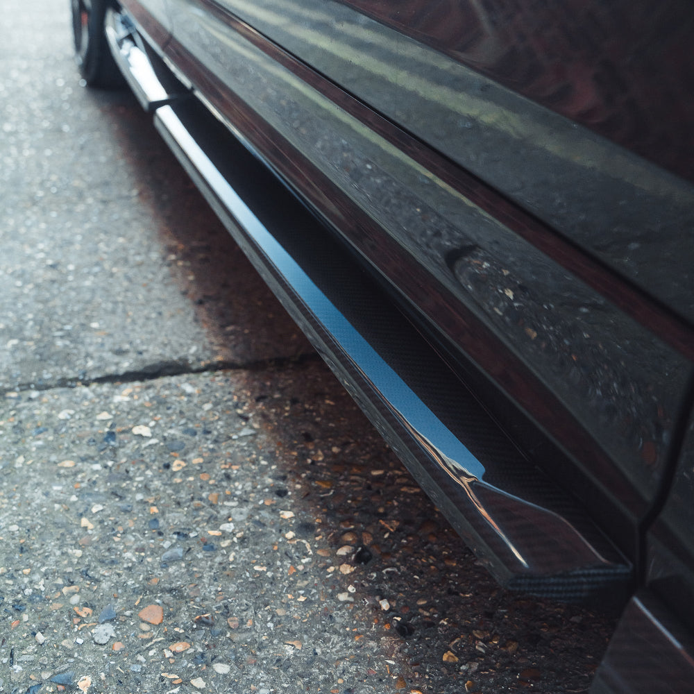 Audi RSQ8 2020+ carbon fibre side skirts by CT Carbon, featuring sleek, lightweight racing-inspired styling for enhanced aerodynamics.