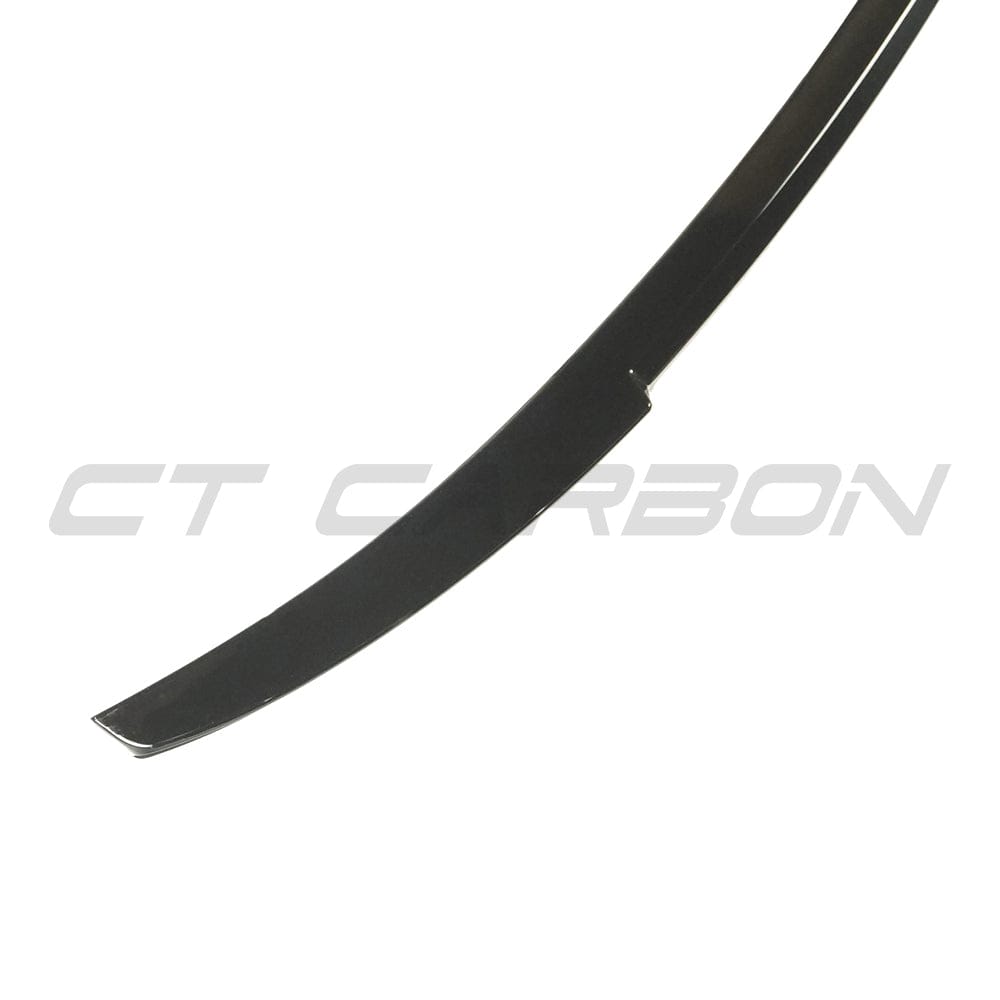 Audi S3/A3 8Y S-Line gloss black saloon spoiler by CT Carbon, M4 style, shown on the vehicle for a sleek, sporty look.