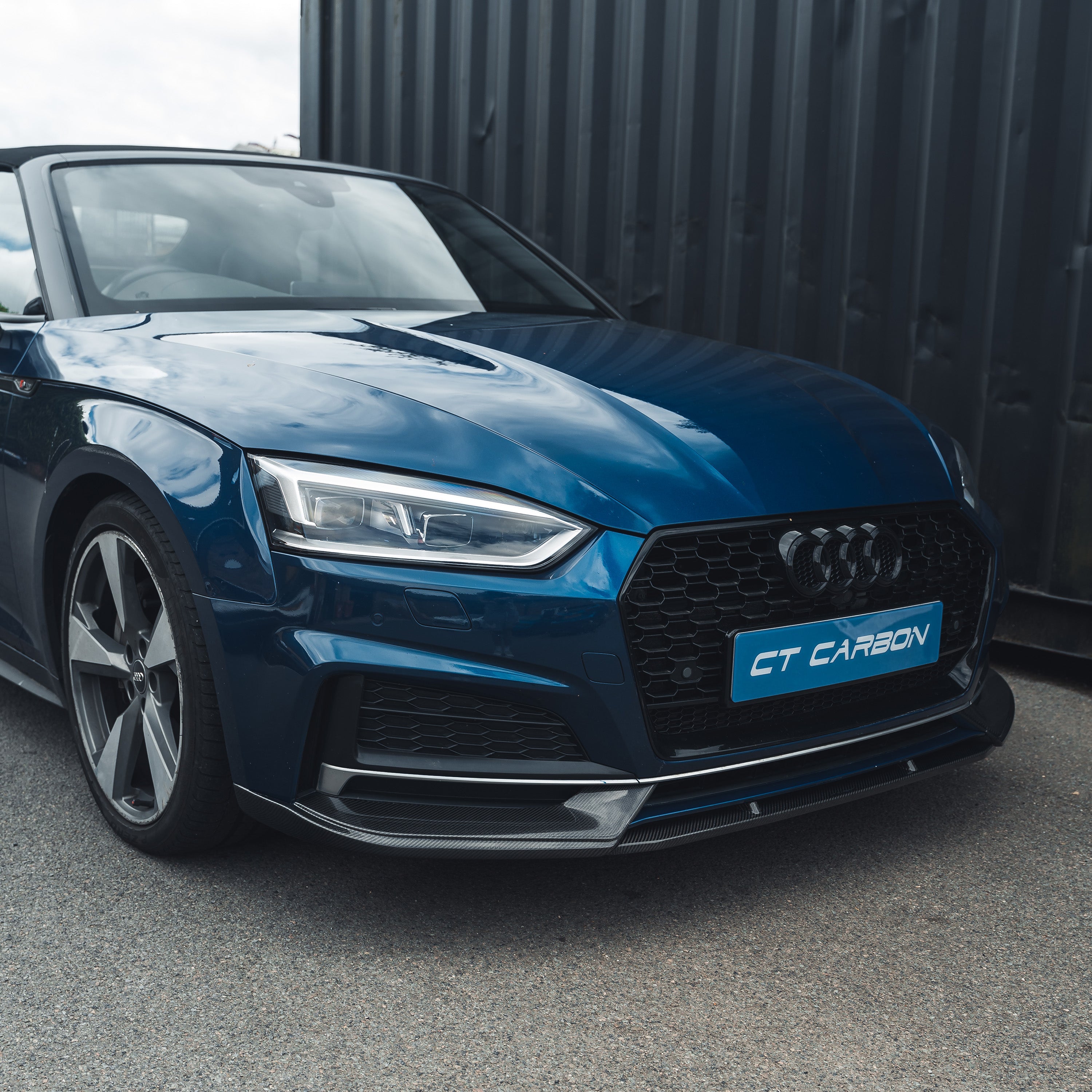 Carbon fibre splitter for Audi A5 S5 B9 (2017-2021) by CT Carbon, shown installed on the front of the vehicle.