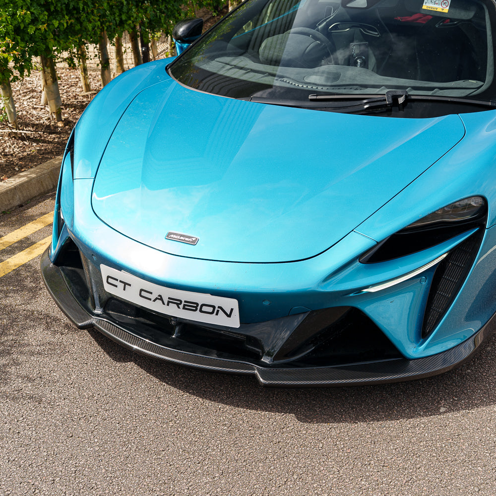 Full view of the CT Carbon McLaren Artura full carbon fibre kit installed on the car, showcasing sleek, lightweight carbon details.