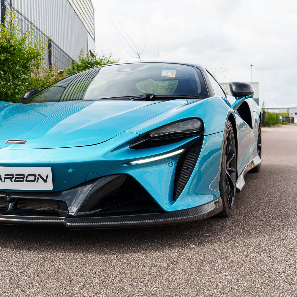 Full view of the CT Carbon McLaren Artura full carbon fibre kit installed on the car, showcasing sleek, lightweight carbon details.