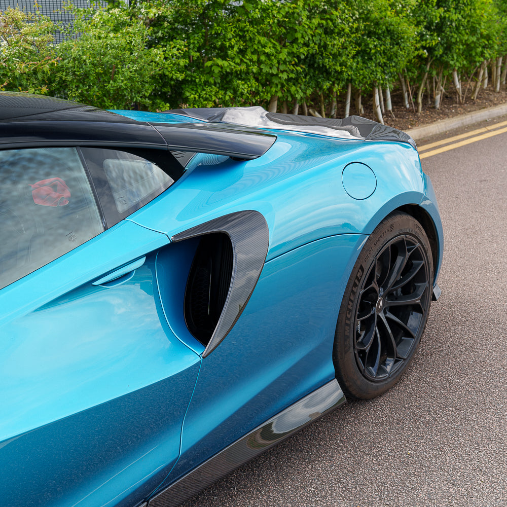 CT Carbon McLaren Artura 2023 carbon fibre side intake vent accessory showing sleek, textured carbon fibre design.