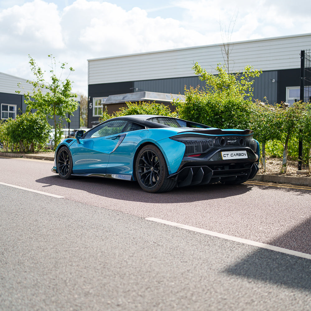 Full view of the CT Carbon McLaren Artura full carbon fibre kit installed on the car, showcasing sleek, lightweight carbon details.