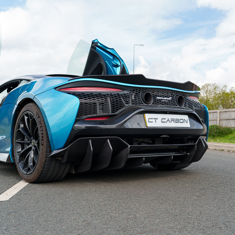 Full view of the CT Carbon McLaren Artura full carbon fibre kit installed on the car, showcasing lightweight, high-performance material.