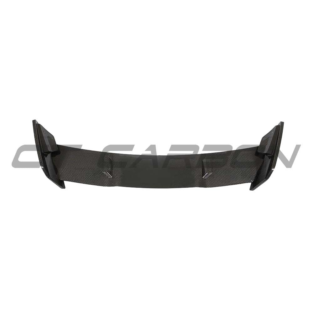 BMW 1 Series F40 and F70 carbon fibre wing spoiler by CT Design, showcasing a sleek, aerodynamic design on a modern car.
