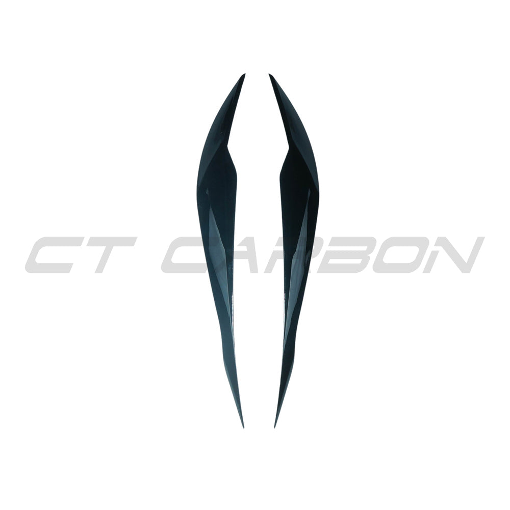 BMW 3 Series F30/F31 GLOSS BLACK headlight eyebrows by CT Carbon, showing sleek, glossy black accessory on car headlights.