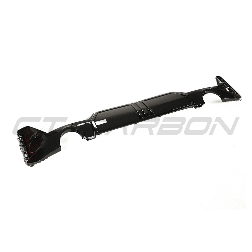 BMW G20 G21 3 Series 2022-2024 CT Carbon gloss black LCI diffuser with round tips, shown installed on the rear bumper.