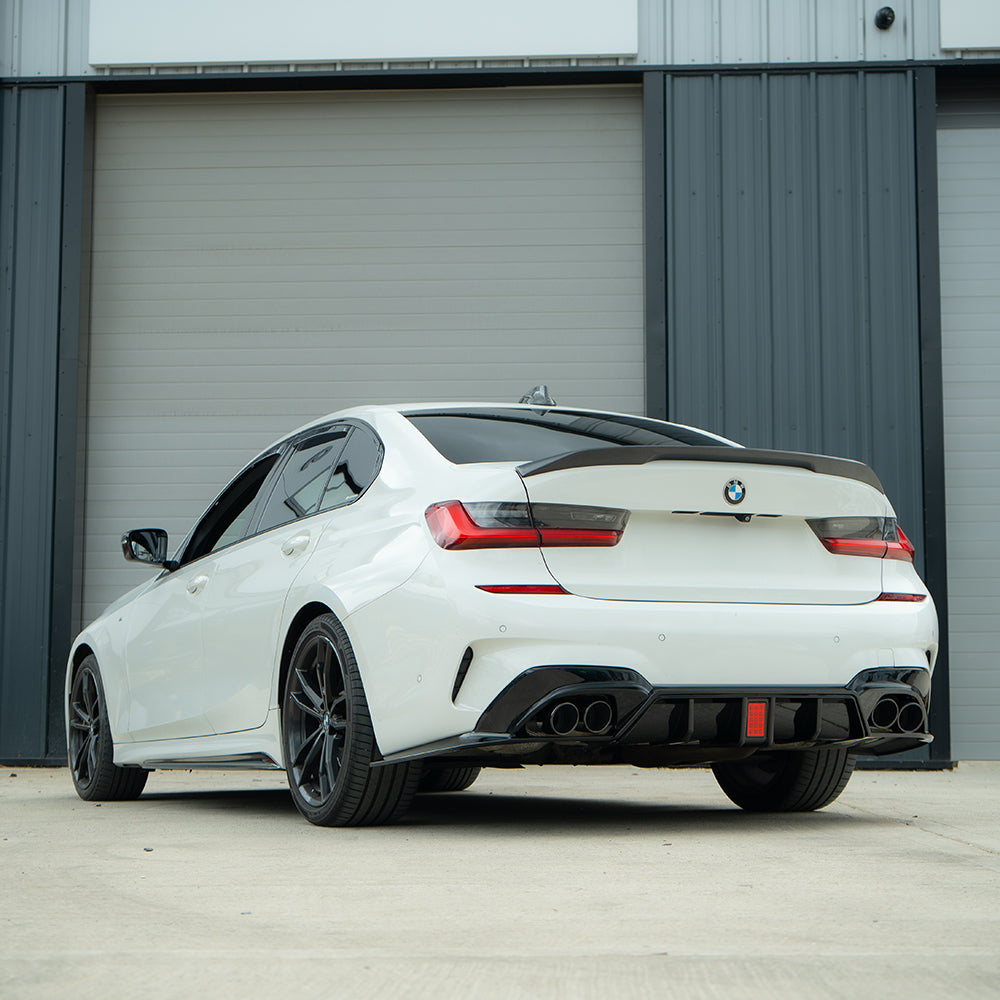 BMW G20 G21 3 Series 2019-2022 CT Carbon gloss LED black diffuser with integrated tips, designed for sporty rear-end styling.