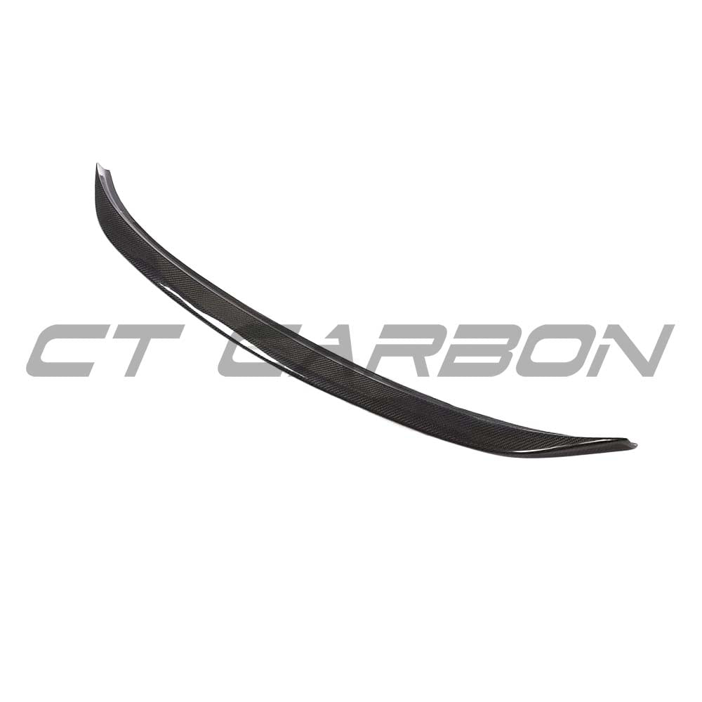 BMW M3 G80 G20 carbon fiber spoiler by CT Carbon, OEM style, showing sleek aerodynamic design on the car's rear.
