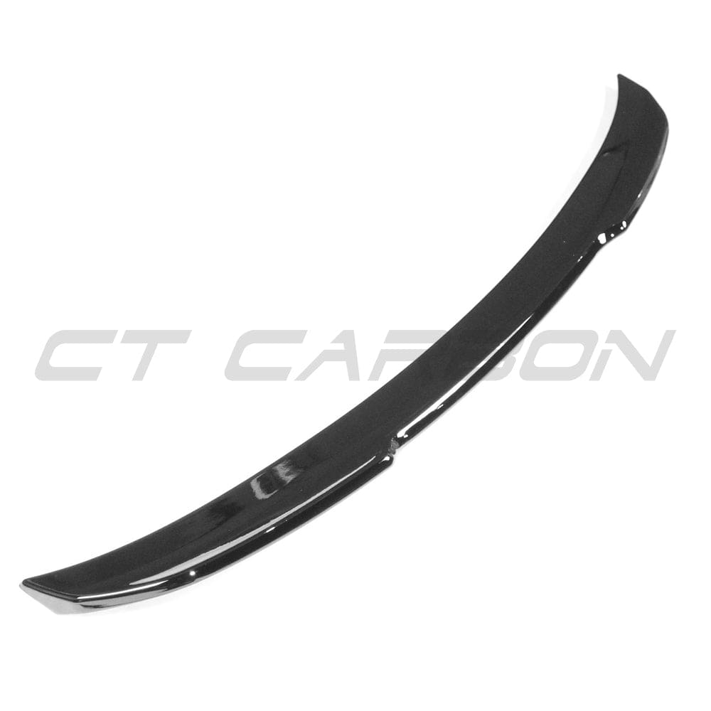 BMW 4 Series F32 V6 gloss black spoiler by CT Carbon, side view showing aerodynamic design and high-gloss finish.