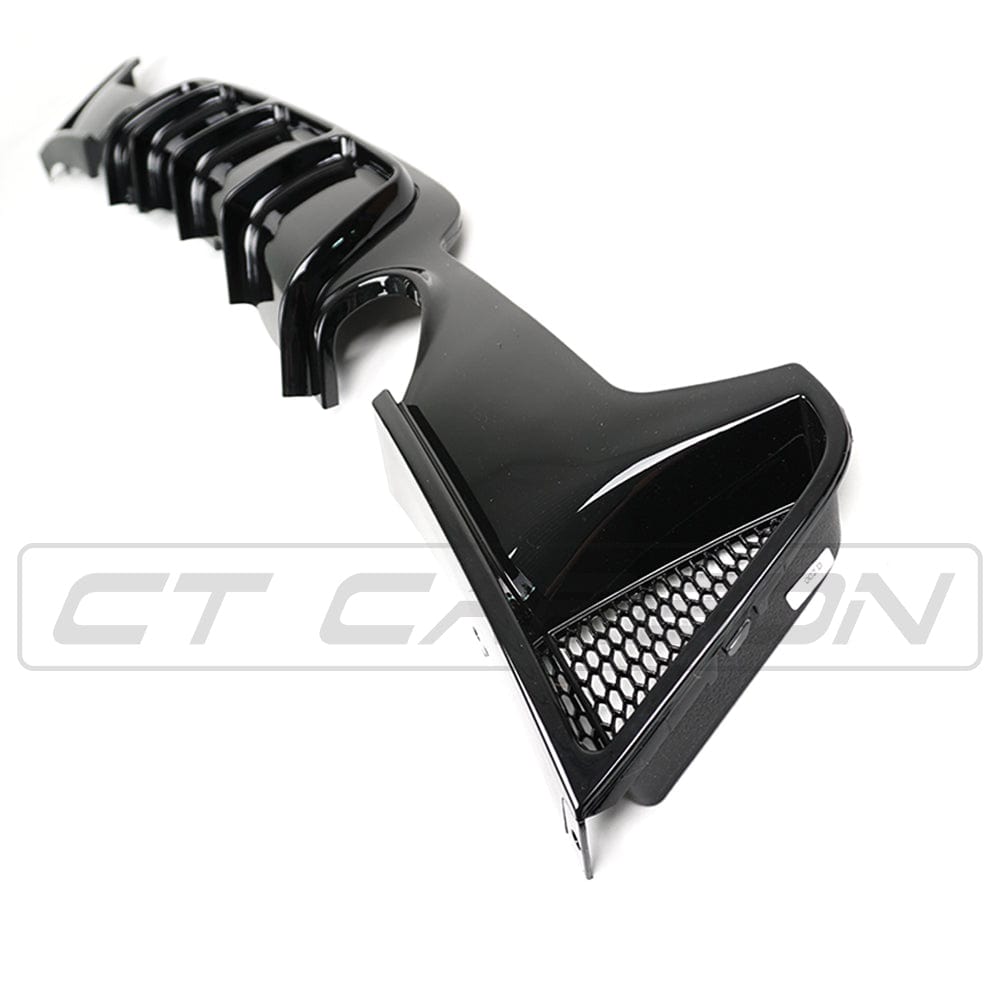BMW 4 Series F33 gloss black full kit with twin exhaust by CT Carbon, showcasing sleek car modification details.