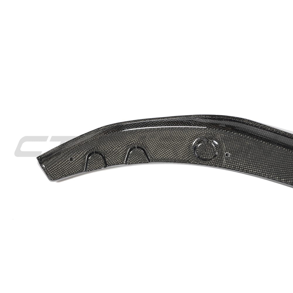 BMW G22 4 Series carbon fibre kit by CT Carbon, featuring splitter with MP style design on a sleek vehicle.