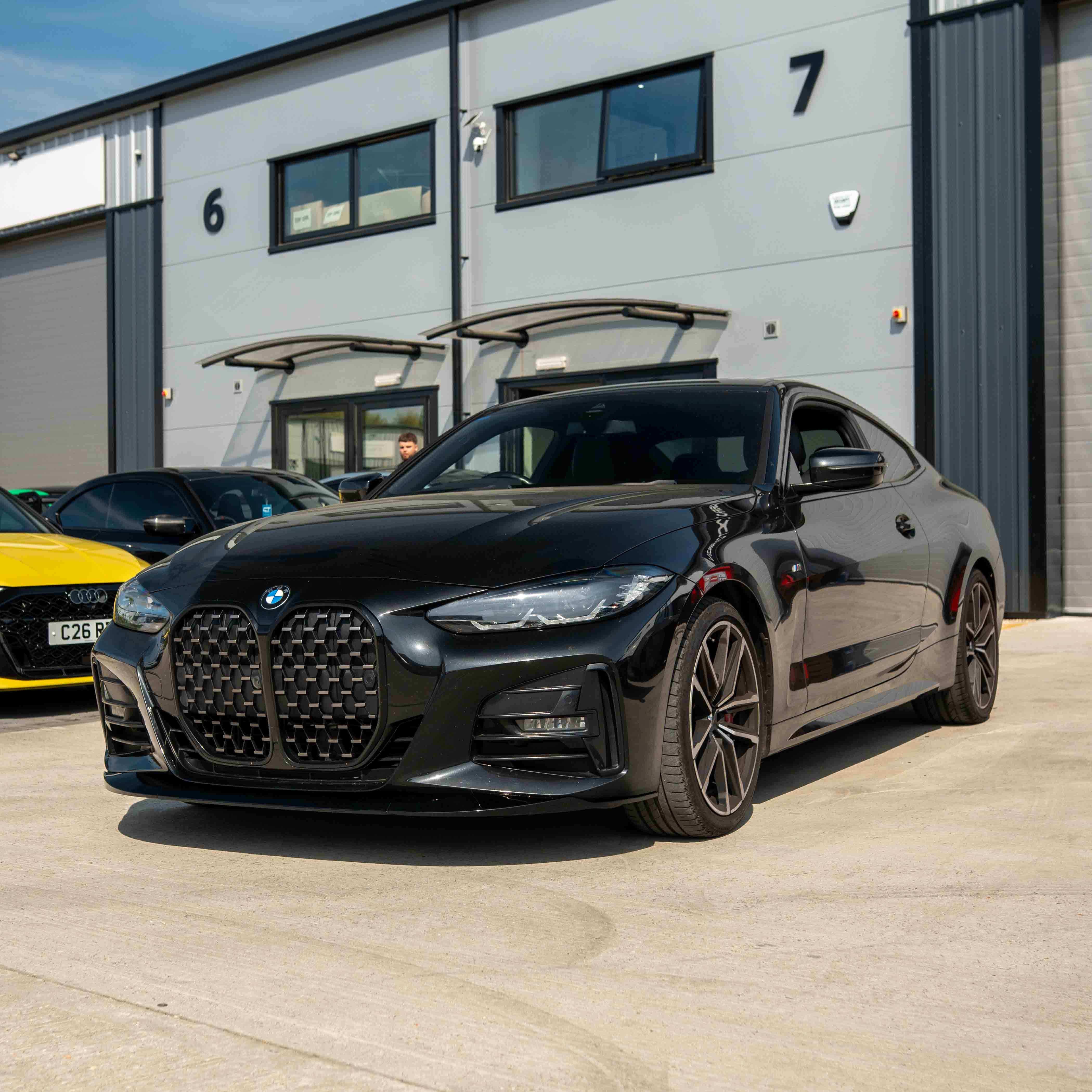 BMW 4 Series G22 G23 CT Carbon gloss black splitter, V1, showing the sleek aerodynamic design and mounting details.