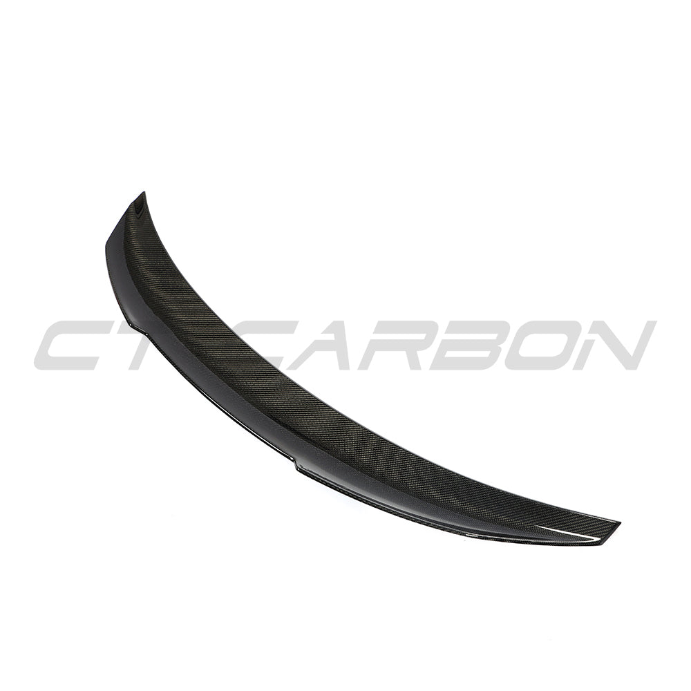 BMW 4 Series G26 and i4 carbon fibre spoiler by CT Carbon, showcasing sleek V1 style on the car's rear.