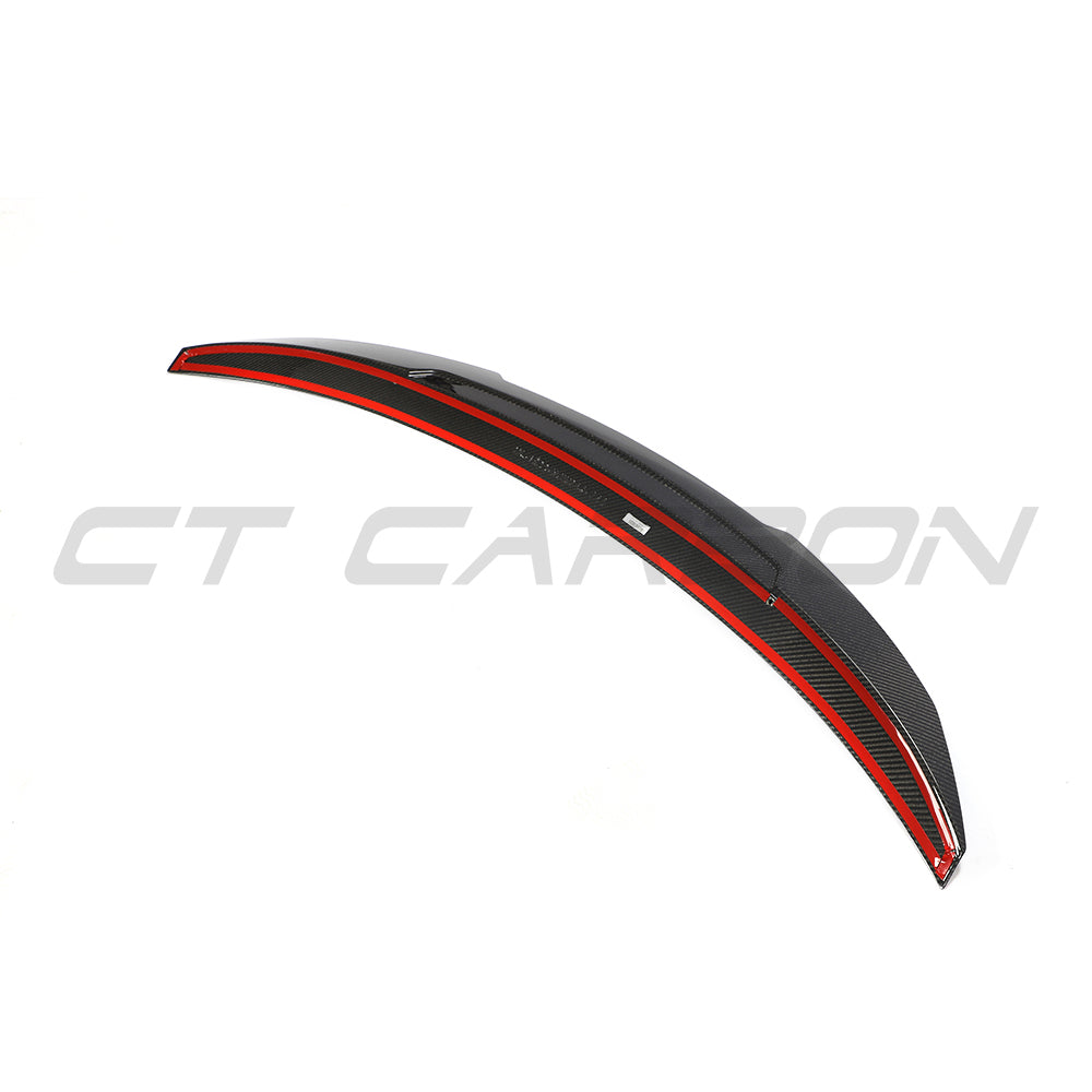 BMW 4 Series G26 and i4 carbon fiber spoiler by CT Carbon, V1, showing sleek aerodynamic design for enhanced sporty look.